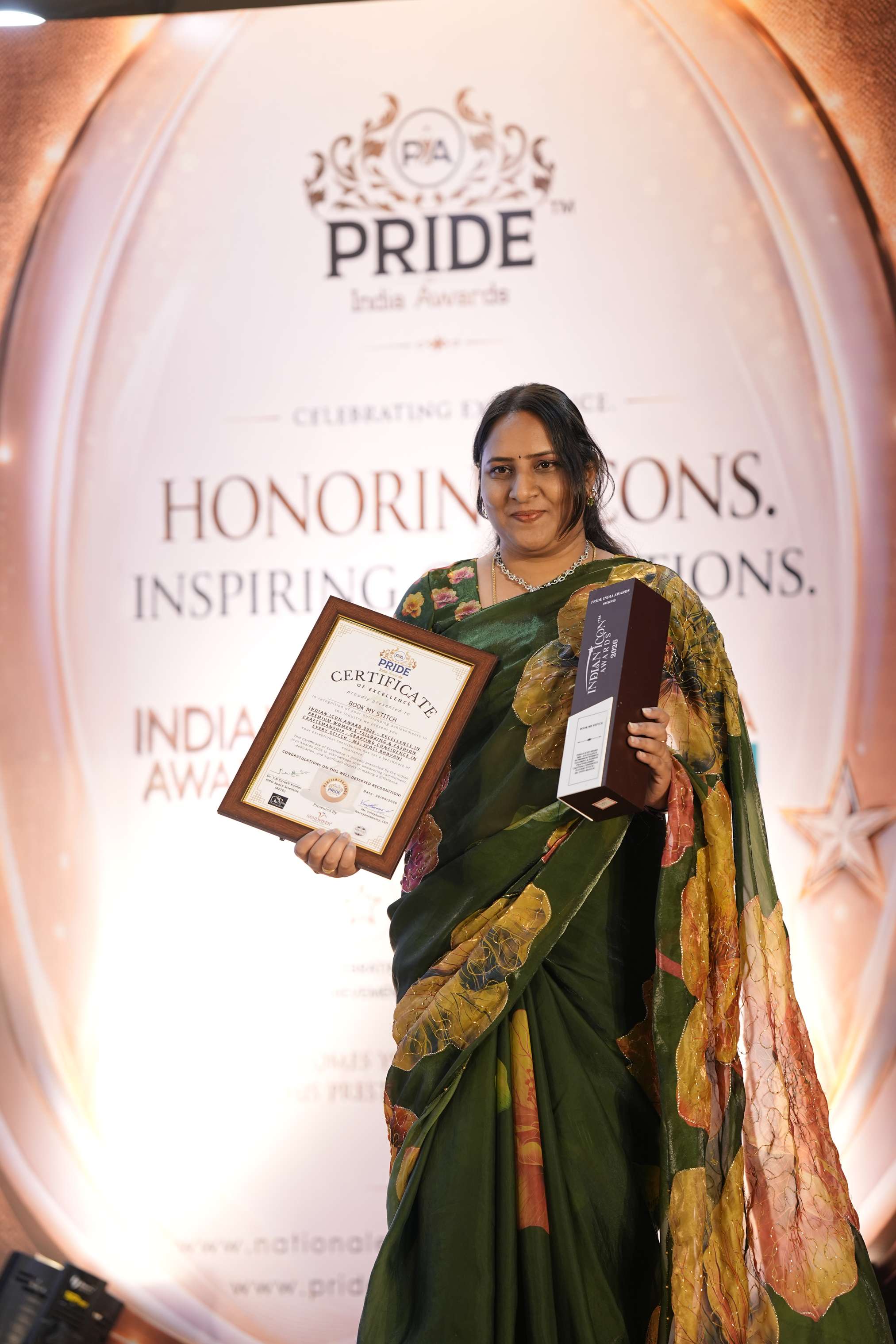 Book My Stitch founder receiving Pride India Award for Excellence in Premium Women's Tailoring